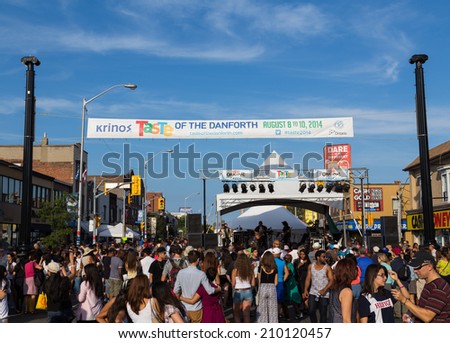 TORONTO, CANADA - 10 AUGUST 2014: People outside a stage for the Taste of Danforth Festival in Toronto