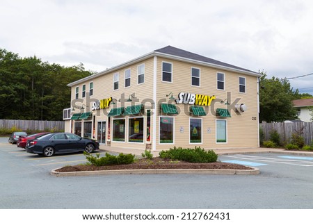 HALIFAX, CANADA  - 22ND AUGUST 2014: The outside of a Subway Restaurant during the day. Cars can be seen parked outside