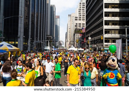 NEW YORK CITY, USA - 31ST AUGUST 2014: Large amounts of people down 6th Avenue in New York City to celebrated Brazil Day 2014.