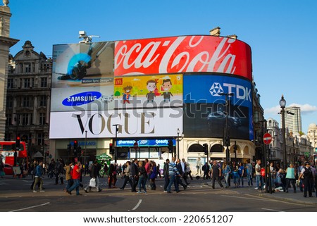 LONDON, UK - 26TH SEPTEMBER 2014: Part of Piccadilly Circus during the day showing large amounts of people outside