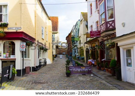 WINDSOR, UK - 1ST FEBRUARY 2014: A street in Windsor during the day, showing various shops and buildings