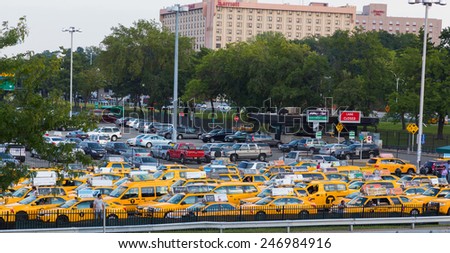 NEW YORK CITY, USA - 1ST SEPTEMBER 2014: Large amounts of New York City Taxi\'s parked up waiting near the airport
