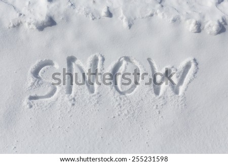 The word Snow written in snow