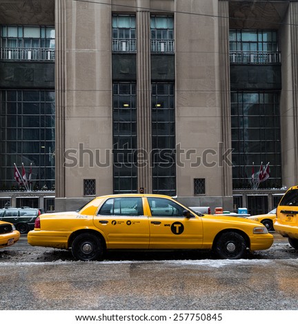 TORONTO, CANADA - 22ND FEBRUARY 2015: A New York City Taxi in downtown Toronto during the day.