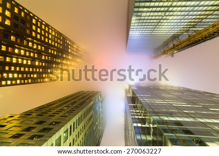 TORONTO, CANADA - 10TH APRIL 2015: Buildings in downtown Toronto during low lying fog at night