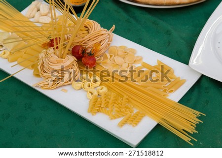 Fresh pasta ingrediants on display outside a restaurant in Rome to entire customers into the restaurant