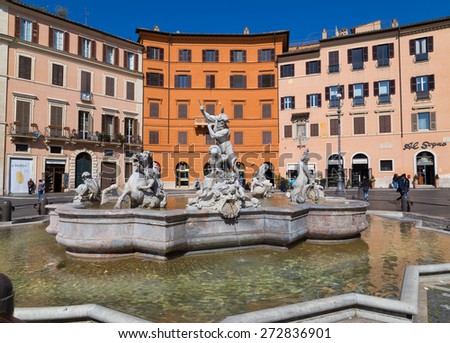 ROME, ITALY - 12TH MARCH 2015: A fountain at Piazza Navona in Rome. People and buildings can be seen in the background.