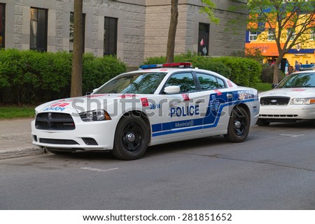 MONTREAL, CANADA - 22ND MAY 2015: A closeup to a parked Police Car in Montreal during the day