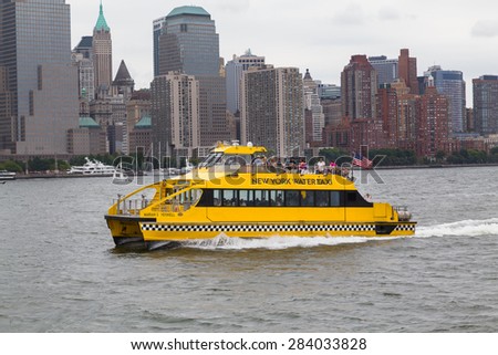 NEW YORK CITY, USA - 30TH AUGUST 2014: A New York Water Taxi boat in the Hudson River with lots of people on board