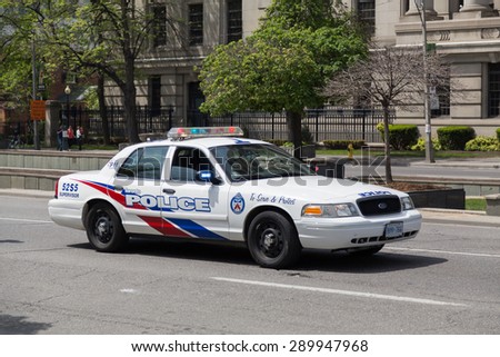 TORONTO, CANADA - 24TH MAY 2015: The outside of a Toronto Police Car during the day.