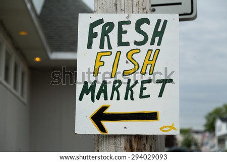 A Sign directing people to a fresh fish market in Cape Breton