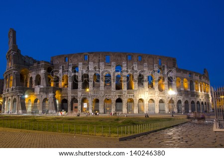 Night scene of Colosseum in Rome, one of the seven wonders of the world.