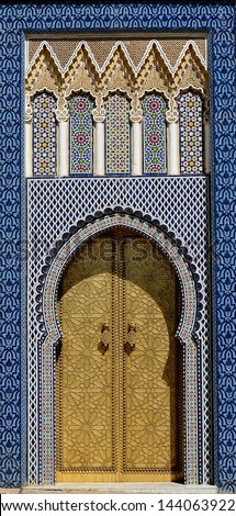 Moroccan entrance - Golden carved door of a palace in Morocco