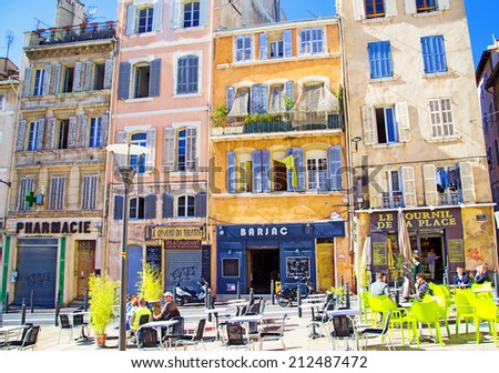 MARSEILLE - MAY 09:People relaxing on outdoor cafe on May 09 2013 in Marseille,France.Ma rseille is France's largest city on the Mediterranean coast and largest commercial port.