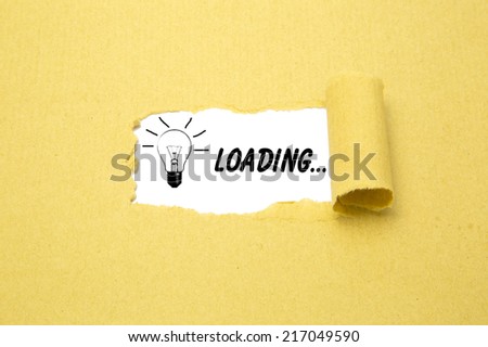 Idea concept, loading an idea with torn brown paper