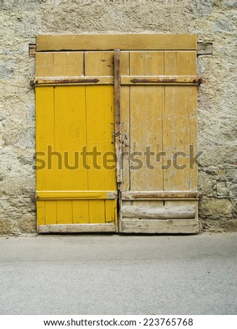 old yellow roll-up door