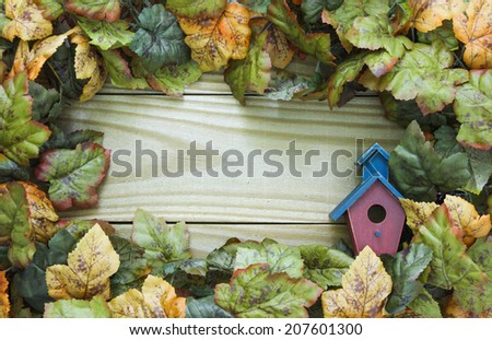Fall leaves with birdhouse border wood sign
