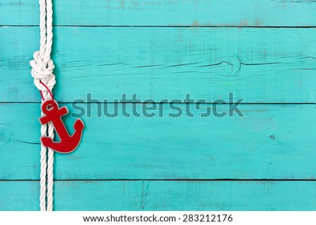 Blank rustic teal blue wooden nautical sign with red anchor and white rope border