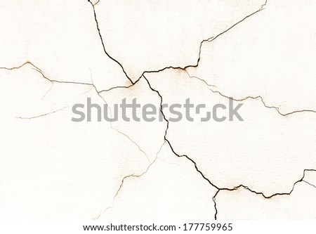 Beautiful old wall with large cracks and texture