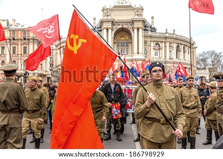 ODESSA, UKRAINE - April 10, 2014 : Victory Day World War II. Holiday parade on the streets. Flag bearer . April 10, 2014 in Odessa , Ukraine.