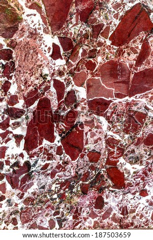 beautiful old reddish-brown pink decorative stone marble abstract cracks and stains on the surface as natural background