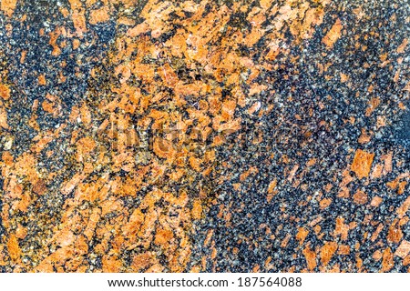 natural background cracked black marble and orange blotches or stone old texture as a retro pattern wall. This concept, conceptual or metaphor wall banner , grunge , material, age , rust