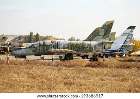 ODESSA, UKRAINE - JUNE 26 , 2011: Old broken military aircraft , jet fighters , bombers and helicopters are on  airplane graveyard obsolete , unserviceable equipment June 26, 2011 in Odessa , Ukraine.