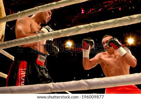 ODESSA, UKRAINE -31 May 2014: World heavyweight boxing champion, Alexander USYK - Ukraine and Cesar David CRENZ  Argentina in the boxing ring. Professional boxing K2, May 31, 2014 in Odessa, Ukraine.
