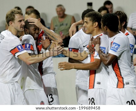 ODESSA, UKRAINE - July 10, 2013: Shakhtar players celebrate their victory, won the cup during football game Shakhtar Donetsk and Chernomorets Odessa, July 10, 2013, Odessa, Ukraine