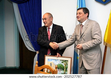 Odessa, Ukraine - June 30, 2010:French delegation mayor and vice-mayor of Marseille Jacques Rocca Serra and Didier Parakian on official in regional administration, June 30, 2010 in Odessa, Ukraine.