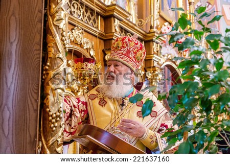ODESSA, UKRAINE - SEPTEMBER 13: Celebration of  Orthodox Christian religious holiday icons of temple in village. Metropolitan of Odessa and Izmail Agafangel, September 13, 2014 in Odessa, Ukraine