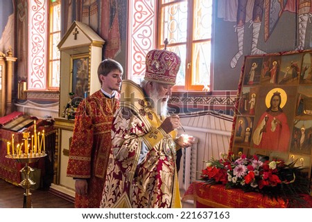 ODESSA, UKRAINE - SEPTEMBER 13: Celebration of  Orthodox Christian religious holiday icons of temple in village. Metropolitan of Odessa and Izmail Agafangel, September 13, 2014 in Odessa, Ukraine