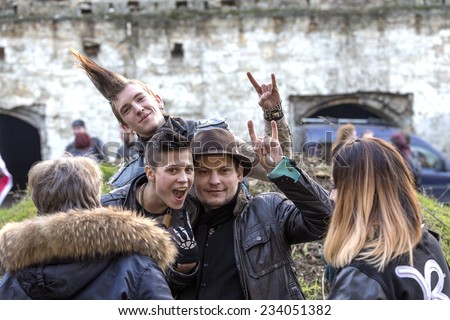 Odessa, Ukraine - November 22: Stylized clothing and hairstyle punk rock band fan party before a rock concert circuit and metal ornaments, November 22, 2014 in Odessa, Ukraine