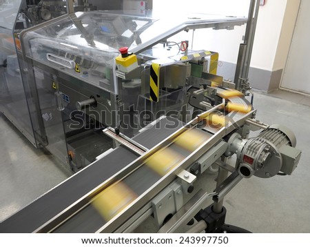 ODESSA, UKRAINE - JULY 11: The modern factory production of pharmaceutical technologies. Pharmaceutical industry. Manufacturing. Conveyor production line of tablets, July 11, 2013 in Odessa, Ukraine