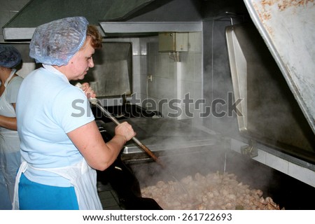 Odessa, Ukraine - July 7, 2007: The factory for the production of food from natural Ingredients. Food Convenience food. Production of dumplings, pancakes. Preparation of filling. Motion Blur.