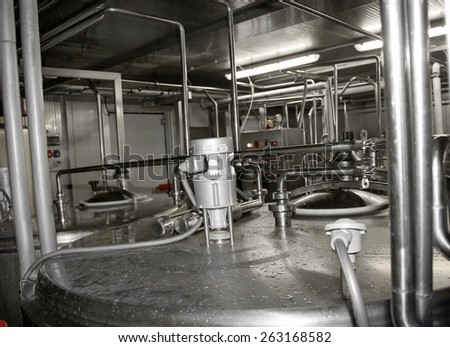 Odessa, Ukraine, April 14, 2011: Modern food processing plant produces milk. Production equipment and process control quality assurance