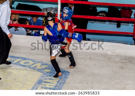 Odessa, Ukraine, April 26, 2015: Cup Ukraine on Thai boxing among children. Kids boxing, kickboxing children. Children fight with these adult emotions. Popularization of sports and healthy lifestyle