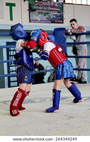 Odessa, Ukraine, April 26, 2015: Cup of Ukraine. Thai boxing among children. Kids boxing, kickboxing children. Children fight with these adult emotions. Popularization of sports and healthy lifestyle