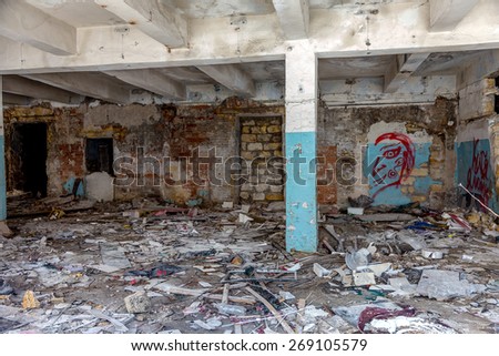 Graffiti artist illegally abandoned in a ruined building. Beautiful street art. Urban contemporary culture. In dark colors. selective Focus