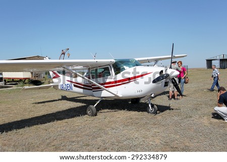 Odessa, Ukraine - July 27, 2011: Young single sports planes are at the airport in the port. Exhibition of small planes. Modern aviation technologies.