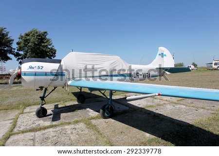 Odessa, Ukraine - July 27, 2011: Young single sports planes are at the airport in the port. Exhibition of small planes. Modern aviation technologies.
