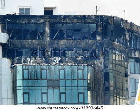 ODESSA, UKRAINE - 30 August 2015: The new construction skyscraper on fire. Violation of safety when building house. Extinguishing system is not working. Large losses of construction company.