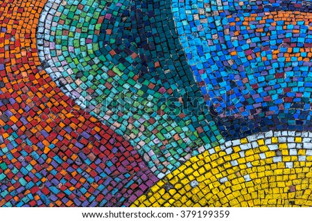 Detail of a beautiful old crumbling abstract ceramic mosaic decoration was destroyed building. Venetian mosaic as a decorative background. Selective focus