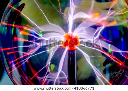 Plasma Ball with purple blue light. Tesla\'s energy sector. The bulk electrical energy in space. Popular scientific physical experience. Physical Laboratory