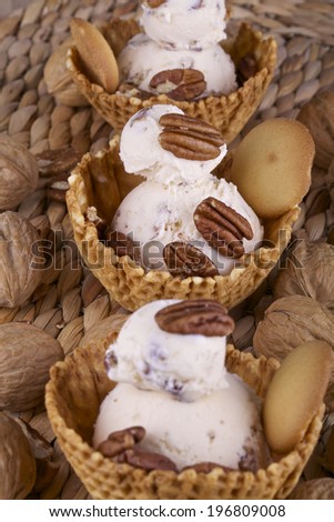 Fresh walnut ice cream in waffle bowls