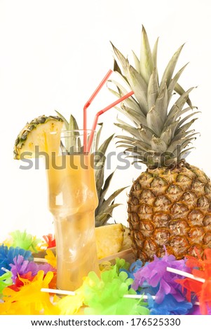 pineapple cocktail with fresh fruit and party decoration, background white