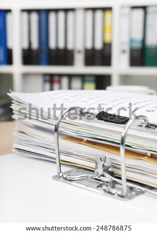 in an office at a desk is a file folder