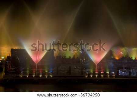 Water dance show at night.  Water and light were used in this show to create movement and a spectacular show.