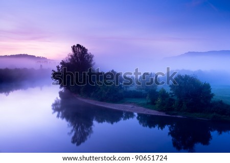 Dawn view of the Dordogne river from Beynac village.