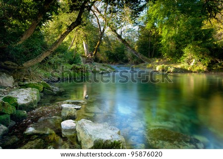 The river Ceou< Dordogne, France.